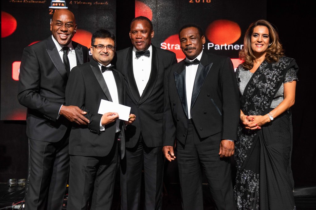 810 9019-Charity Partner Devlon Malcom for Chance to Shine with guests